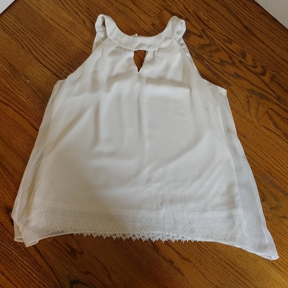 White lacy date-night blouse